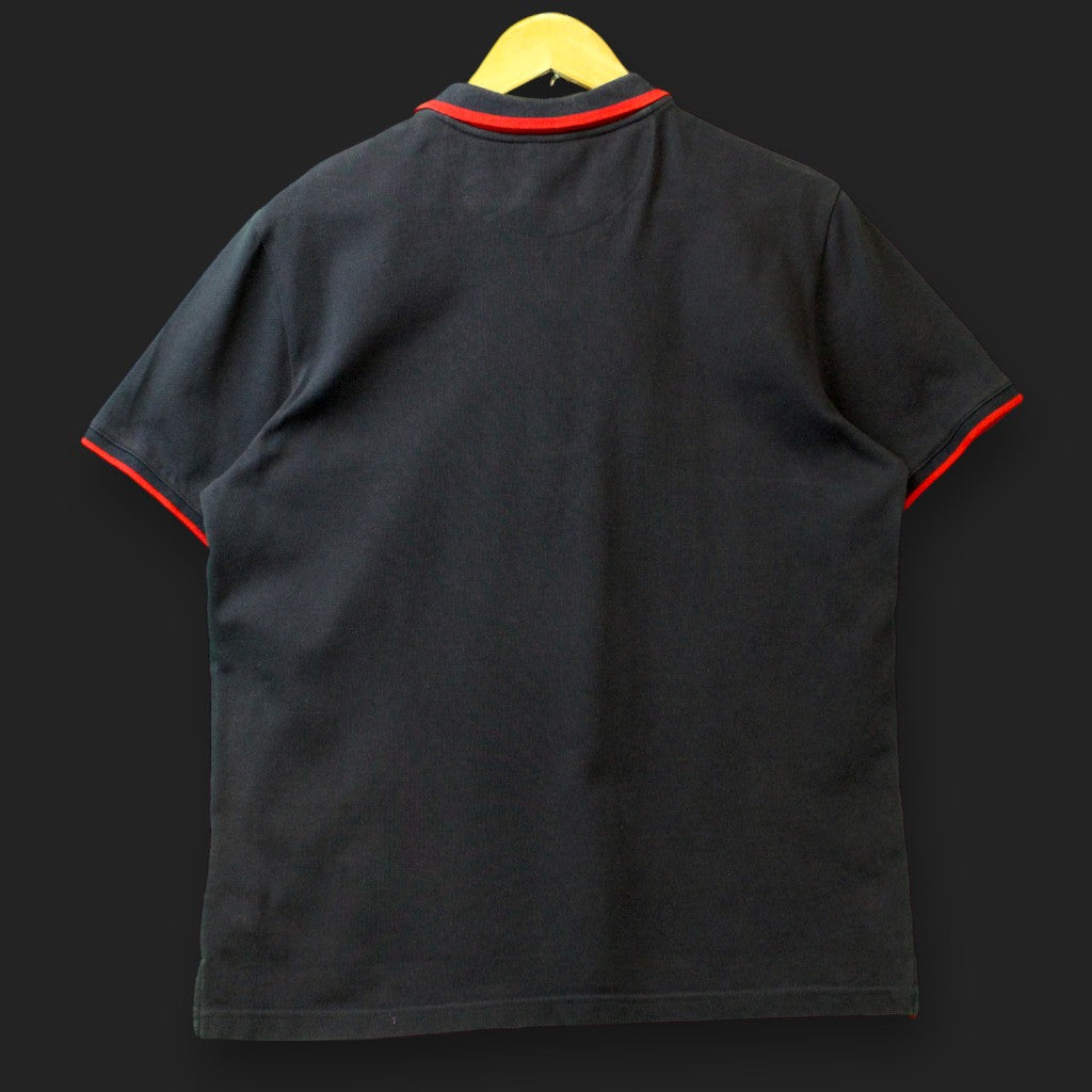 Champion – Poloshirt mit großem Logo