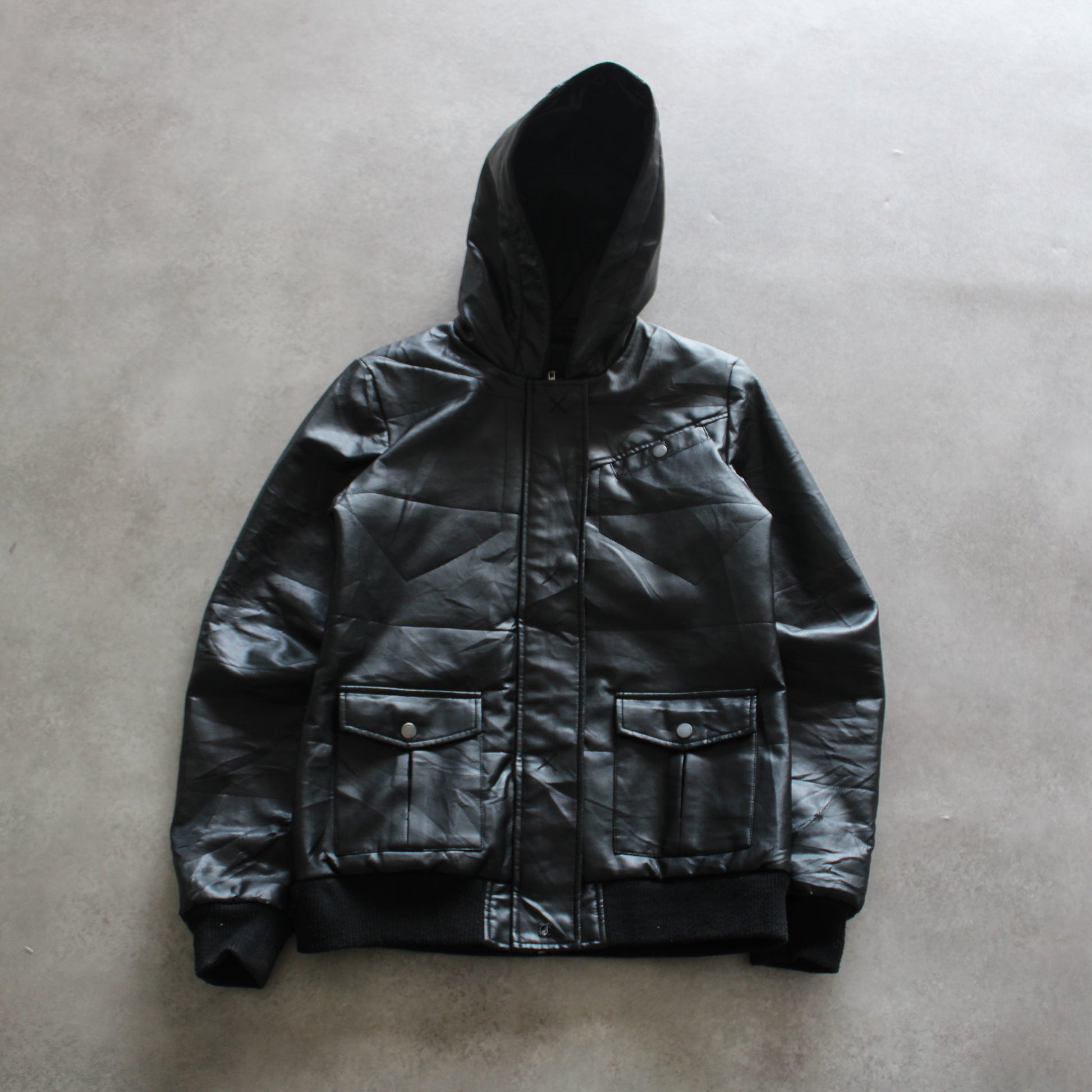 volcom jacket, faux leather jacket, black hooded jacket, streetwear outerwear, men’s urban jacket, volcom streetwear