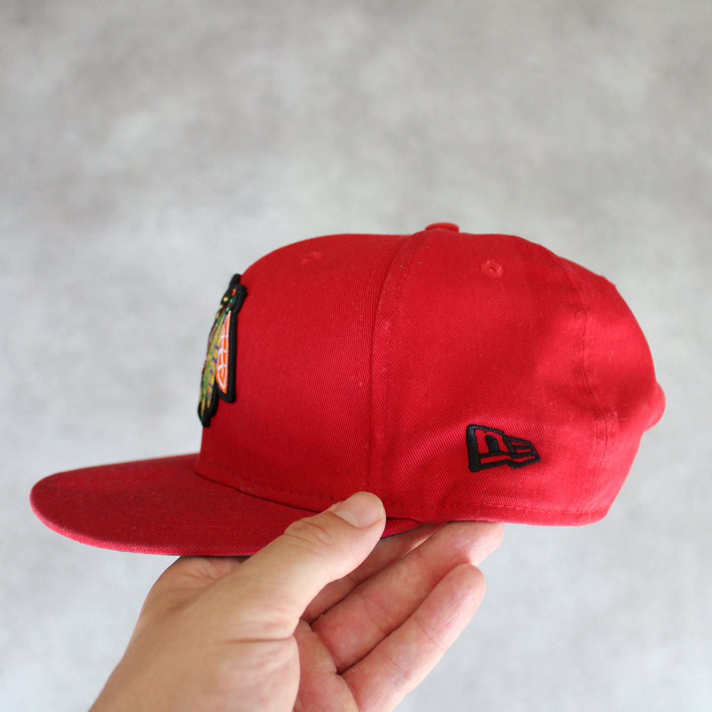 New Era Embrioed Snapback Cap